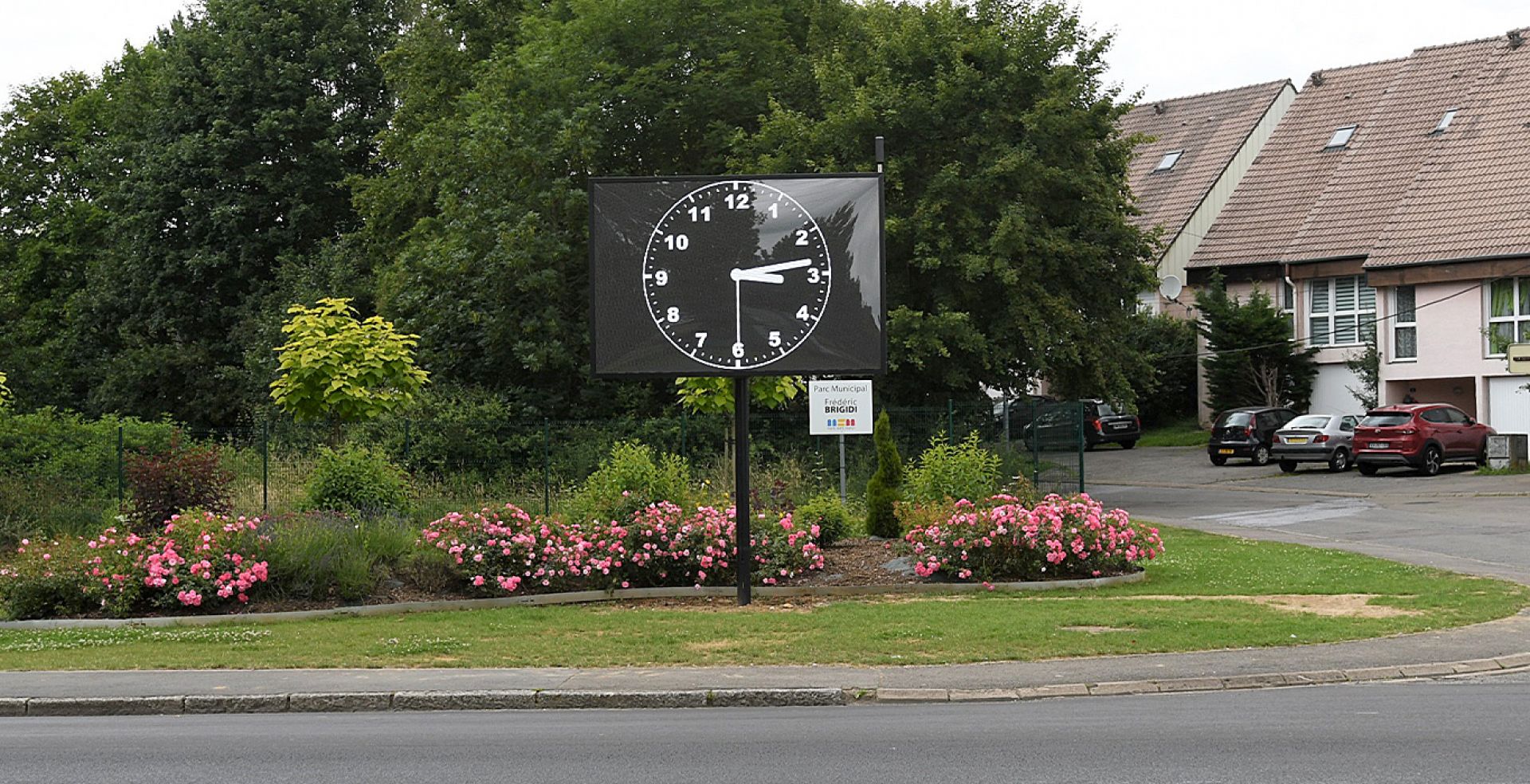 a clock on a sign