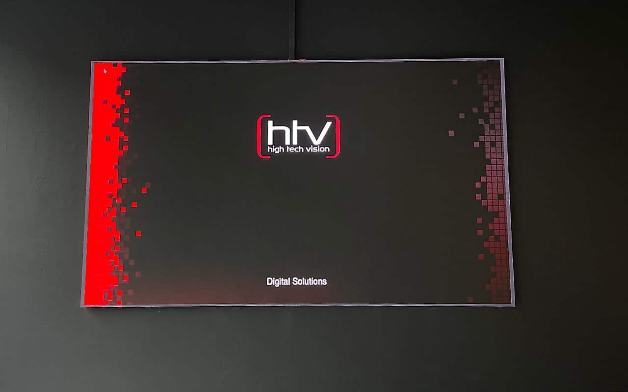 a rectangular black and red rectangular object with white text